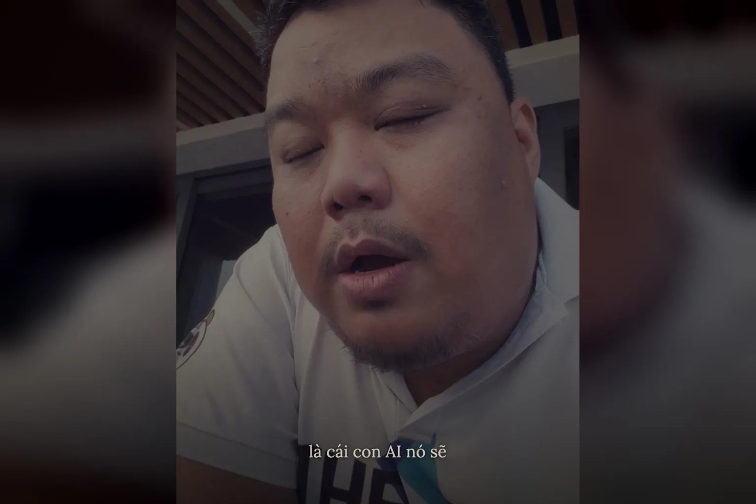 AI edit video giữ mood chậm rãi: Hùng mặc polo trắng quay video tâm sự ngoài ban công chiều Sài Gòn sắp mưa